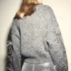 Pull en maille avec plumes