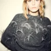 Pull en maille avec plumes