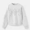 Pull en maille à paillettes