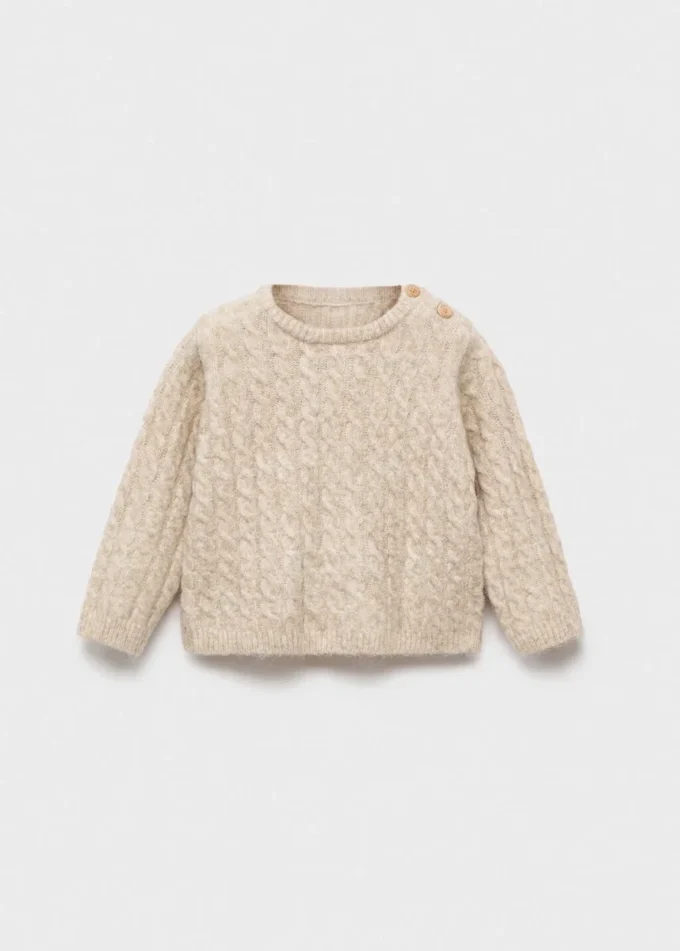 Pull en maille torsadée