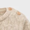 Pull en maille torsadée
