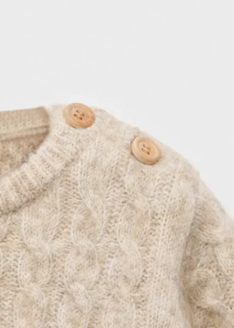 Pull en maille torsadée