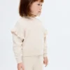Pull en maille à volants