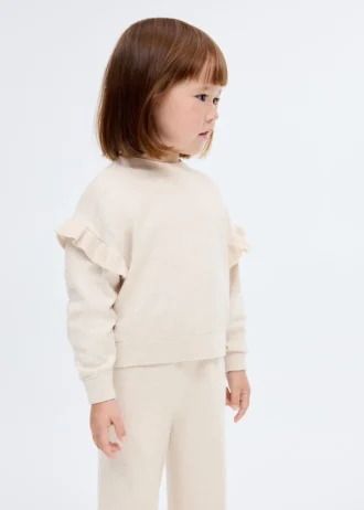 Pull en maille à volants