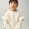 Pull en maille à volants