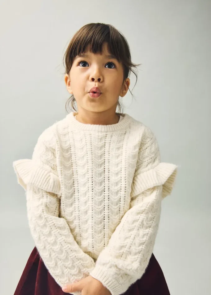Pull en maille à volants