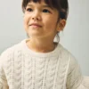 Pull en maille à volants