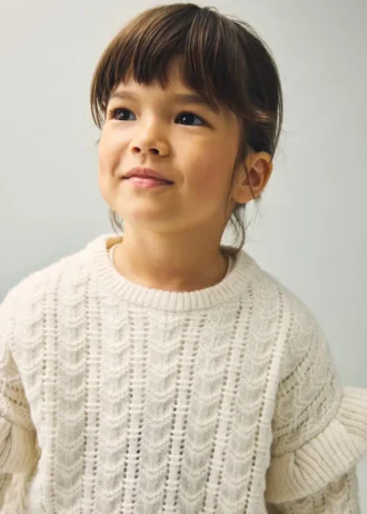 Pull en maille à volants