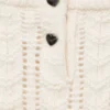 Pull en maille à volants