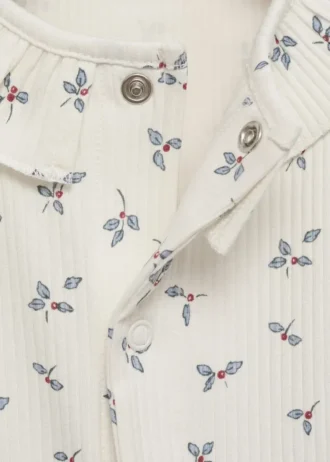 Pyjama à fleurs et col bébé