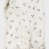 Pyjama à fleurs et col bébé