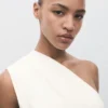 Robe asymétrique en maille combinée Robe asymétrique en maille combinée