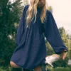 Robe à carreaux avec détails brodés Robe à carreaux avec détails brodés