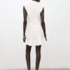 Robe à col haut avec volants Robe à col haut avec volants