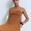Robe en lurex avec dos croisé Robe en lurex avec dos croisé