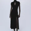 Robe en velours avec boutons-pression et fente Robe en velours avec boutons-pression et fente