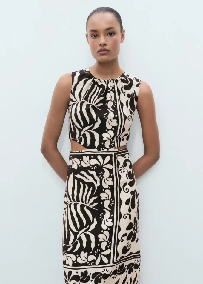 Robe midi avec découpes Robe midi avec découpes