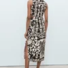 Robe midi avec découpes Robe midi avec découpes