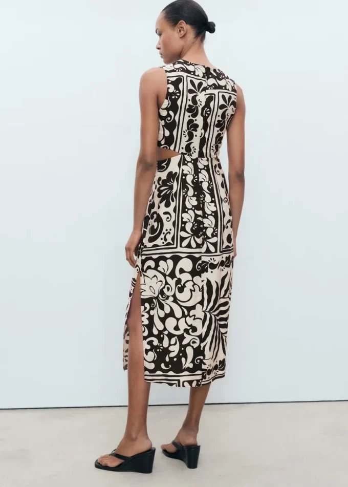 Robe midi avec découpes Robe midi avec découpes