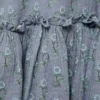 Robe à volants et à fleurs Robe à volants et à fleurs