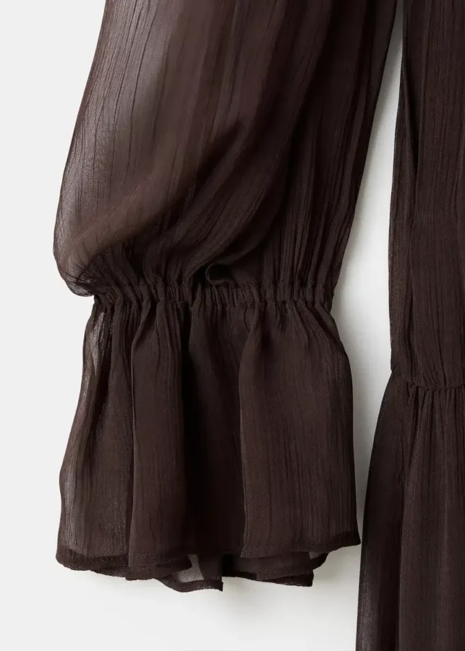 Robe à volants et manches bouffantes Robe à volants et manches bouffantes
