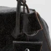 Sac à bandoulière en cuir avec breloques Sac à bandoulière en cuir avec breloques