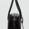 Sac à bandoulière en cuir avec breloques Sac à bandoulière en cuir avec breloques