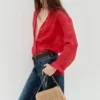 Sac à bandoulière en fibres naturelles avec clous Sac à bandoulière en fibres naturelles avec clous