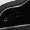 Sac à bandoulière en simili cuir verni Sac à bandoulière en simili cuir verni