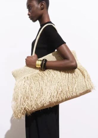 Sac cabas en fibres naturelles avec pompons
