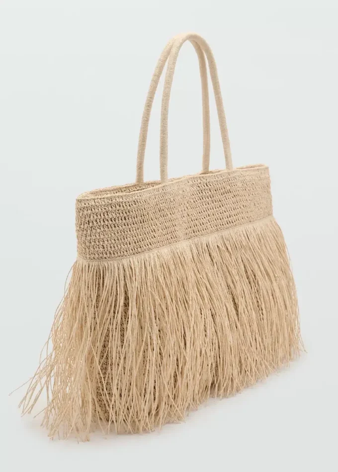 Sac cabas en fibres naturelles avec pompons Sac cabas en fibres naturelles avec pompons