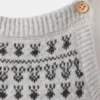 Salopette avec bordure brodée Salopette avec bordure brodée