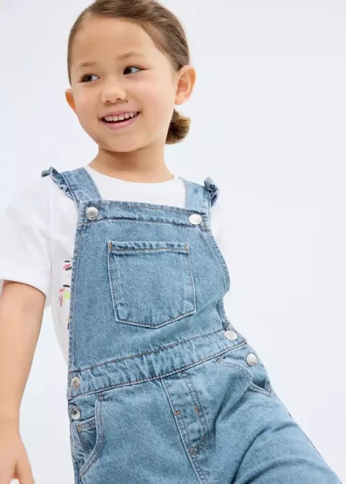 Salopette en denim à volants