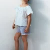 Short en denim à ourlet effiloché Short en denim à ourlet effiloché