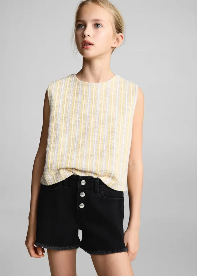 Short en denim à ourlet effiloché