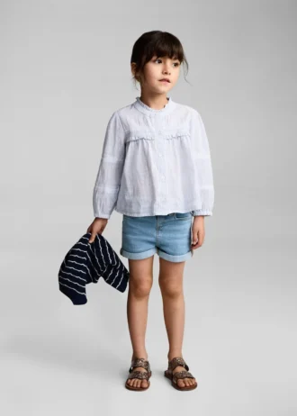 Short en denim à revers