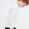 T-shirt avec poche et coutures apparentes