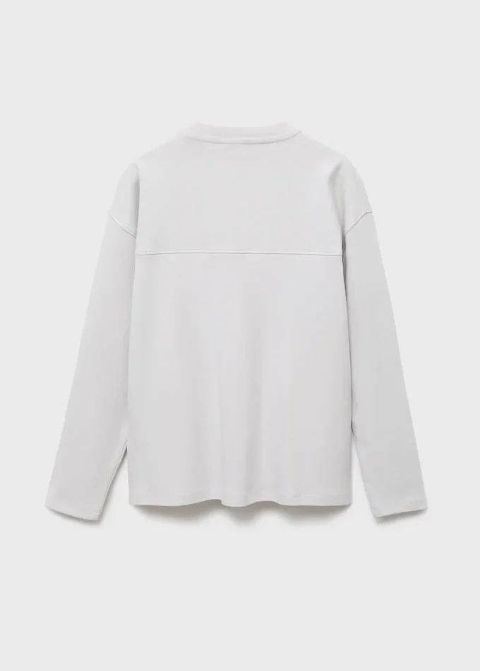 T-shirt avec poche et coutures apparentes
