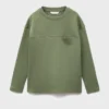 T-shirt avec poche et coutures apparentes