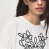 T-shirt en coton brodé de fleurs