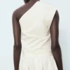 Top asymétrique brodé de fleurs