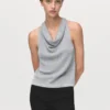 Top en maille lurex avec encolure drapée.