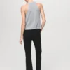 Top en maille lurex avec encolure drapée.