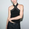 Top à paillettes et encolure dos nu