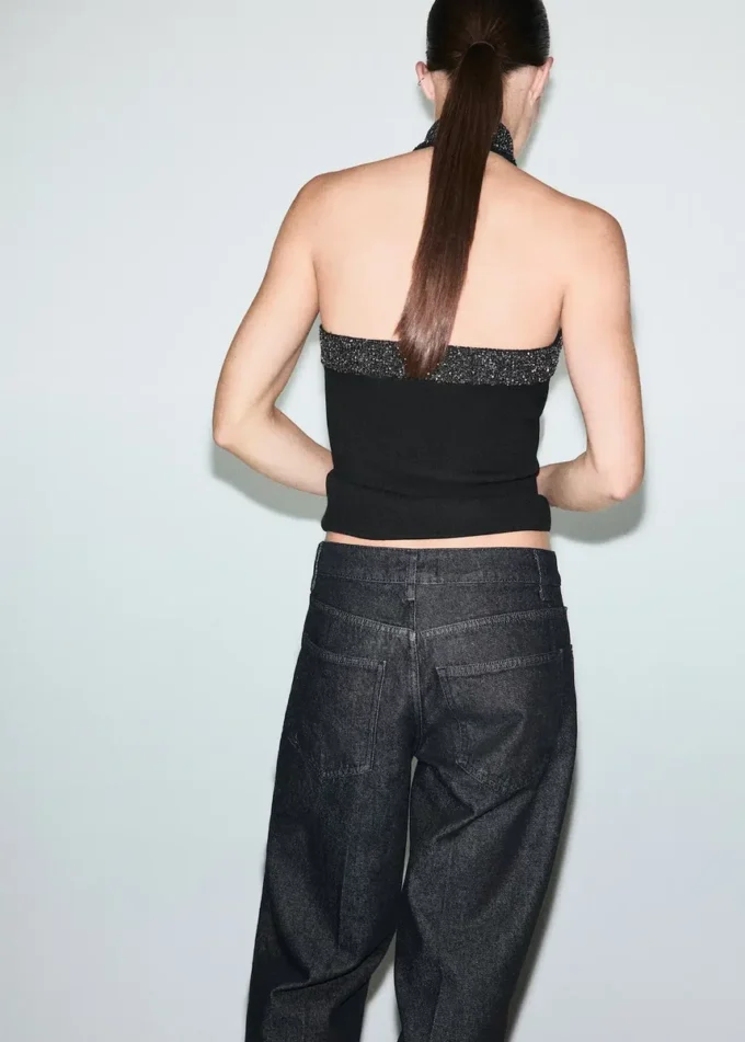 Top à paillettes et encolure dos nu