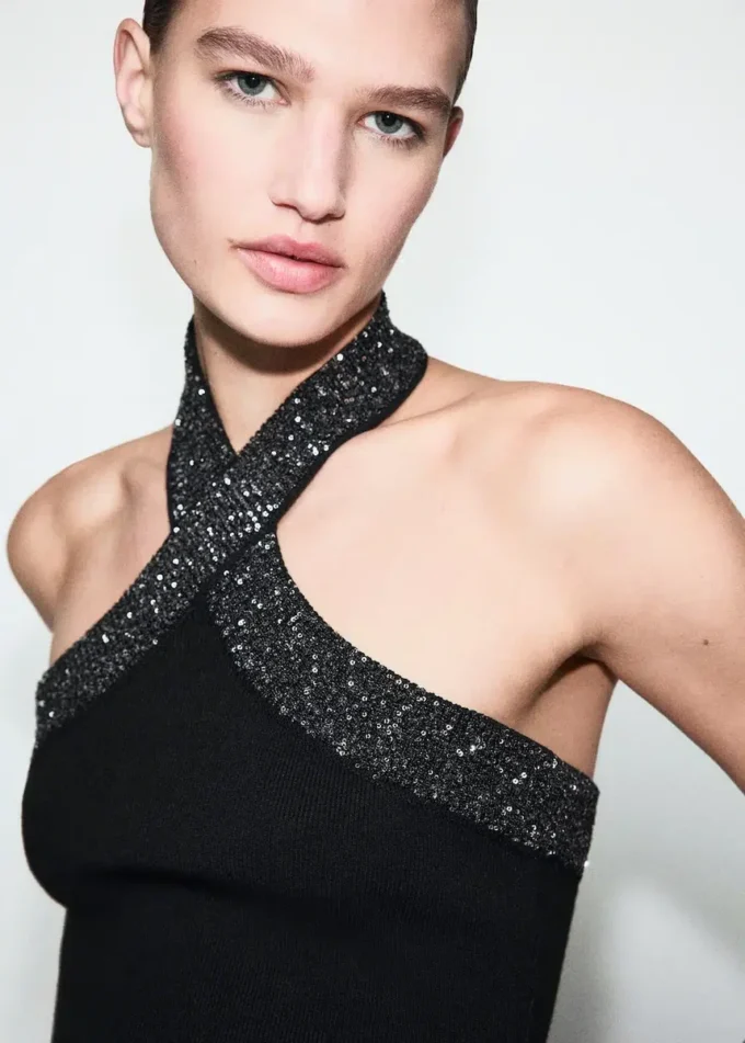 Top à paillettes et encolure dos nu