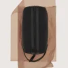Trousse de toilette avec détails en cuir