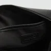 Trousse de toilette à bandoulière contrastée