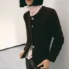 Veste bouclée avec boutons bijoux