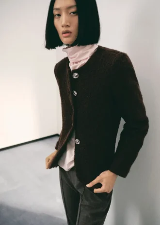 Veste bouclée avec boutons bijoux